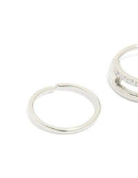 Designed with surgical steel cubic zirconia hinged and simple nose rings in a 2-pack with diamond accents and statement style close up view - link has visual effect only
