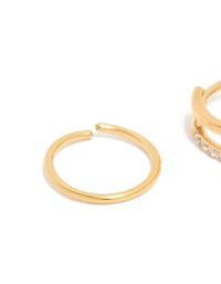 Close-up view of gold plated surgical steel nose rings with cubic zirconia in a 2-pack close up view - link has visual effect only