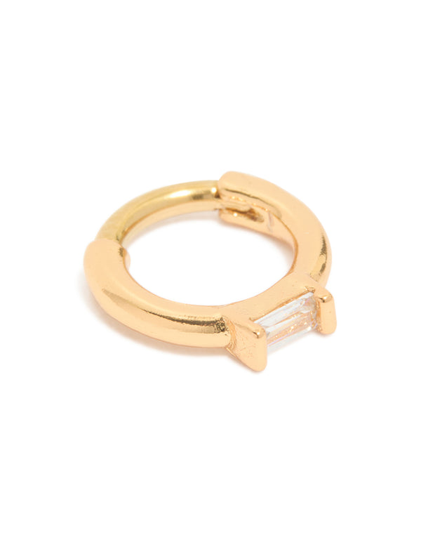 Showcasing a gold plated surgical steel rectangle cubic zirconia baguette clicker ring in clear stone side view