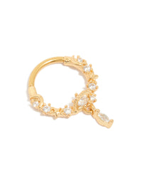 Elegant gold plated surgical steel cubic zirconia planet drop clicker ring with celestial star accents in detail view - link has visual effect only