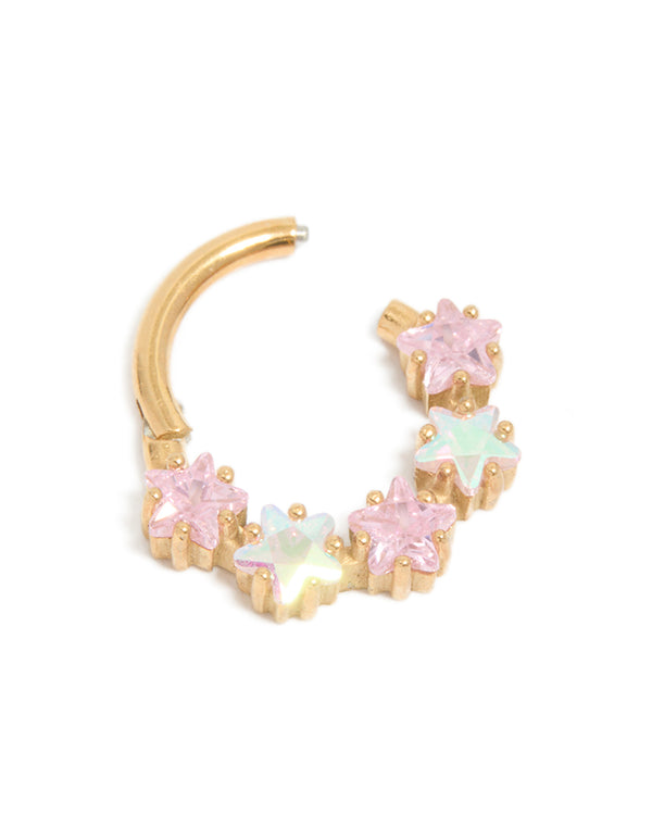 Designed with celestial stars, this gold plated surgical steel clicker ring features pink cubic zirconia and pale turquoise stones detail view