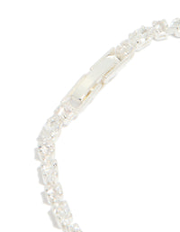 Showcasing the secure fastening mechanism, this silver plated cubic zirconia dainty oval tennis bracelet features a closure detail view - link has visual effect only