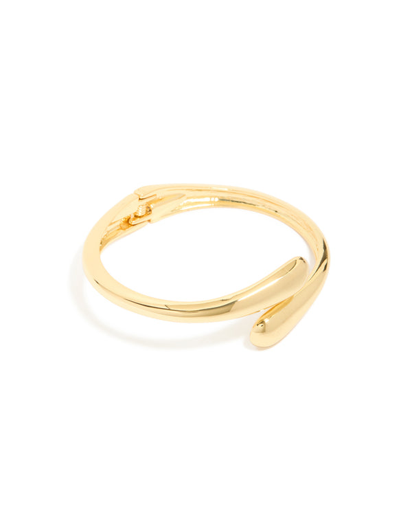 Crafted from gold plated material, this open wrap hinged bangle features a sleek design front view
