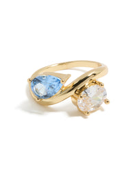 Gold plated ring clear and blue cubic zirconia frontview - link has visual effect only