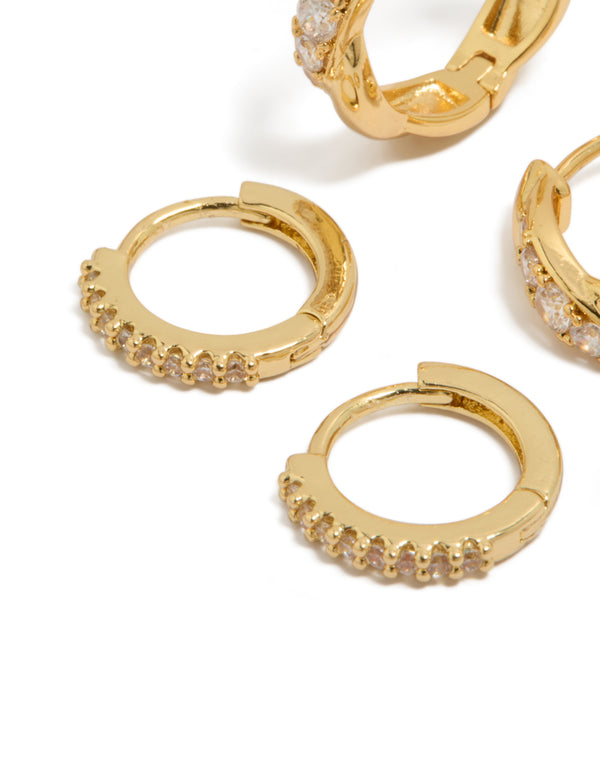 Elegant gold plated brass woven and fine cubic zirconia huggie earrings in a 2-pack featuring crystal details with hoop closure close up view