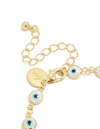 A gold plated brass evil eye chain bracelet with statement style closure detail view - link has visual effect only