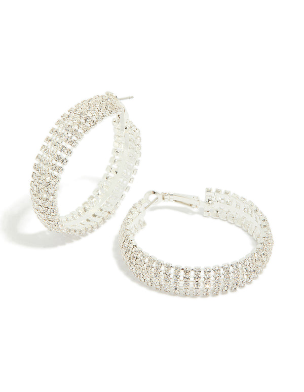 Showcasing silver diamante hoop earrings in a front view