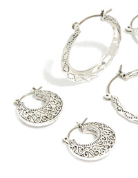 Featuring antique silver textured edged hoop earrings in a 3-pack with intricate detailing with a close up view - link has visual effect only