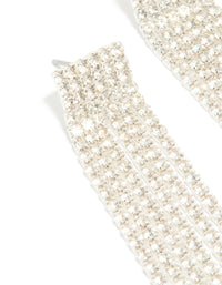 Crafted with silver diamante waterfall drop earrings featuring tassel strands close up view - link has visual effect only
