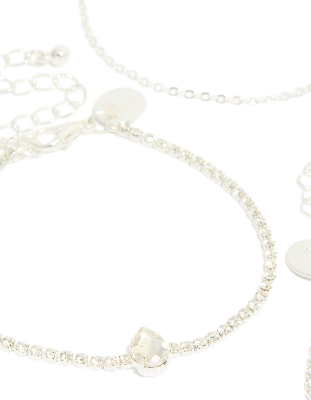 Crafted from silver diamante flower and chain bracelets 4-pack featuring floral details in statement style close up view