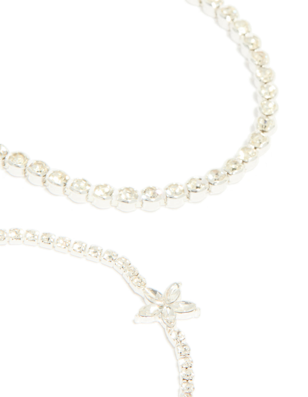 Designed with silver diamante flower and chain bracelets 4-pack with floral feature in statement closure detail view