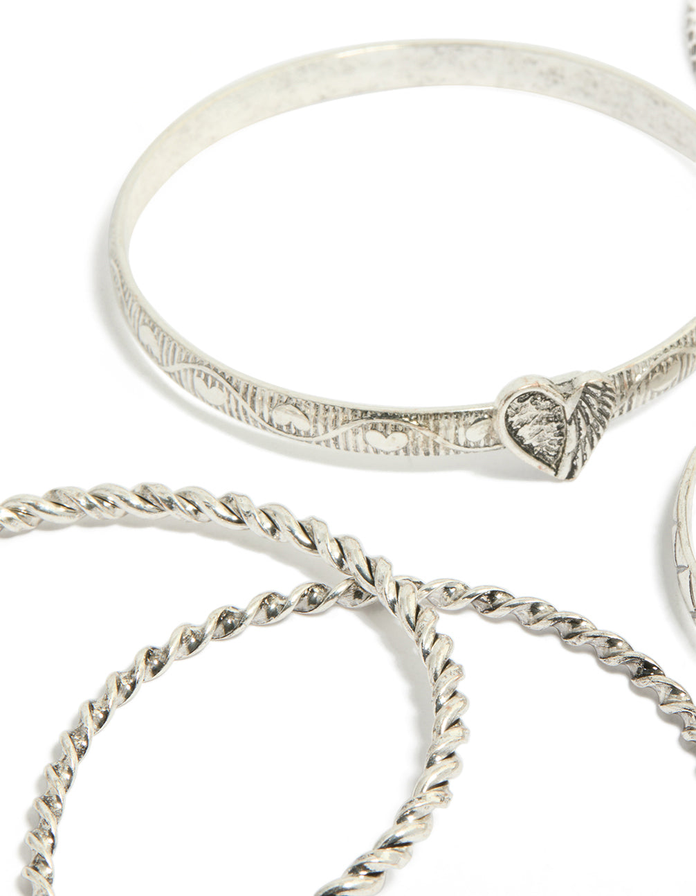 Showcasing silver textured and plain bangles 6-pack with bird, celestial and heart detail in close up view