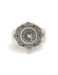 Crafted from stainless steel, this statement watch ring features black dial with round shape designed for women in casual analog style, with link band in silver watch face detail view - link has visual effect only