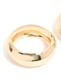 Featuring a 2-pack of gold oversized chunky statement bangles close up view - link has visual effect only