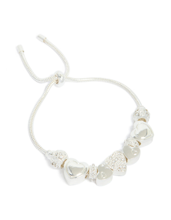 Elegant silver diamante heart charm toggle bracelet featuring balls front view