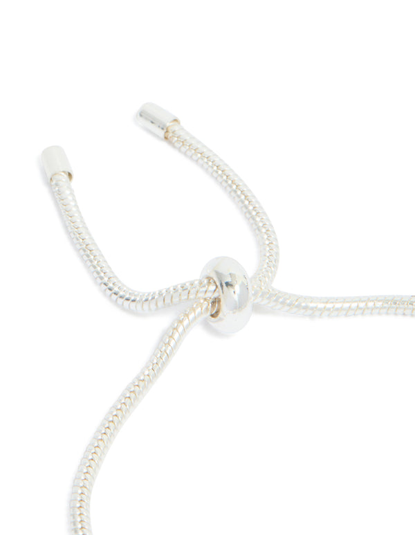 Silver diamante heart charm toggle bracelet with balls closure detail view