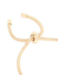Featuring a gold blue diamante and molten heart charm toggle bracelet with beaded and balls design in closure detail view - link has visual effect only