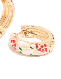 Close view of gold enamel floral thick earrings with chunky huggie closure in pink, red, and green pattern post detail view - link has visual effect only
