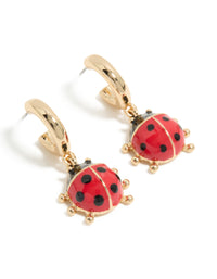 Discover gold ladybug huggie earrings featuring with red and black detailing front view - link has visual effect only