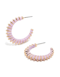 Featuring statement hoop earrings with textured gold and lilac enamel in a lavender color front view - link has visual effect only