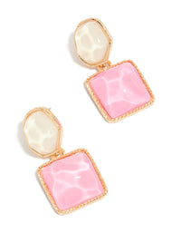 Showcasing statement drop earrings with round and square organic pink pool effect accents in gold front view - link has visual effect only