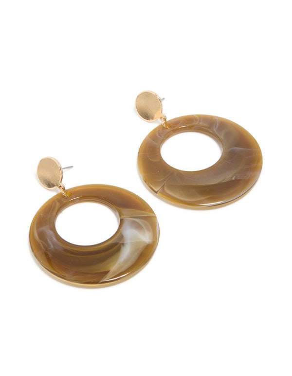 Showcasing circle drop earrings with marble pattern in gold and brown tones front view