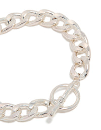 Featuring a silver chunky T-bar bracelet with bar detailing closure detail view - link has visual effect only