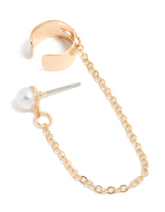 Showcasing a statement stud earring with gold chain ear cuff featuring pearl detail front view