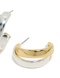 Highlighting mixed metal plated layered medium hoop earrings with gold and silver post detail view - link has visual effect only