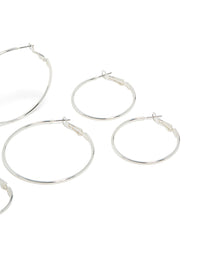 Designed with silver plated material, these fine thin hoop earrings in a 4-pack showcase closure mechanisms post detail view - link has visual effect only