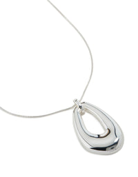 Discover this long organic pendant necklace crafted from plated material in a polished finish close up view - link has visual effect only