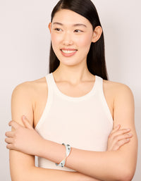 Crafted from silver plated hammered twist hinged bangle on model view - link has visual effect only