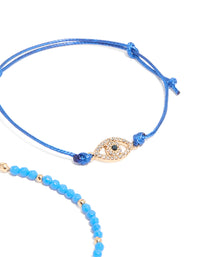 This beaded bracelets 4-pack showcases evil-eye accents, crafted from cord in gold closure detail view - link has visual effect only