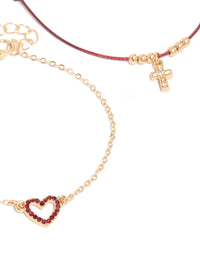 Crafted from burgundy cord cross and crimson heart in gold close up view - link has visual effect only