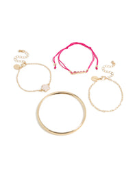 Showcasing gold clover and hot pink cord bracelets in a 4-pack featuring floral details with light pink accents and bangle styles front view - link has visual effect only