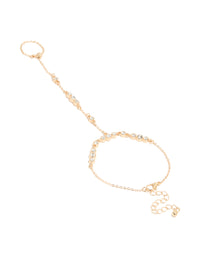 Showcasing a gold adjustable hand chain front view - link has visual effect only