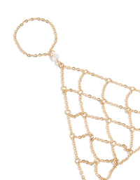 Featuring a statement gold mesh hand chain bracelet with close up view - link has visual effect only