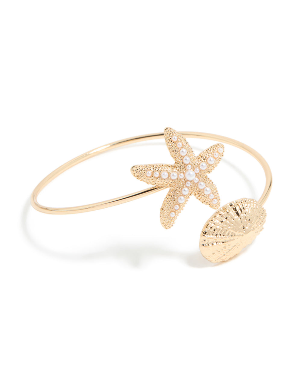 Featuring a gold shell and pearl starfish arm cuff with ocean-inspired front view