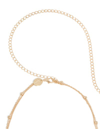 Designed with a gold ball and shell charm layered waist chain featuring pearl accents, embellished detailing, and ocean-inspired elements in closure detail view - link has visual effect only