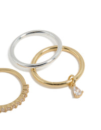 Crafted from mixed metal plated organic cubic zirconia rings 4-pack with charm in gold and silver tones side detail view - link has visual effect only