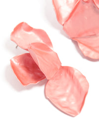 Elegant coated metal drop earrings with floral petal design in light pink and coral close up view - link has visual effect only