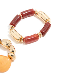 Presenting beaded stretch bracelets in a 2-pack crafted from irregular acrylic with gold accents in maroon, orange, and peachpuff colors, detail view - link has visual effect only