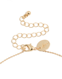 Highlighting a kids sausage dog shaker necklace with animal featuring glitter pendant in gold clasp detail view - link has visual effect only