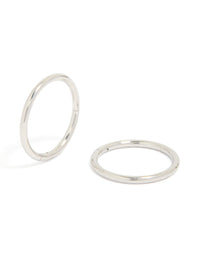 Showcasing statement chunky surgical steel sleeper hoop earrings in silver front view - link has visual effect only