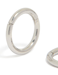 Detailed view of chunky surgical steel 6 mm thick sleeper hoop earrings in silver with closure mechanism close up view - link has visual effect only