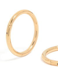 Featuring gold plated surgical steel 8 MM thick sleeper earrings with hoop closure close up view - link has visual effect only