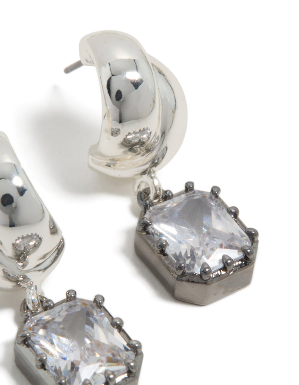 Crafted from silver and gunmetal plated metal featuring statement drop earrings with square cubic zirconia stones highlighting post detail view