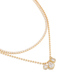 Beautifully crafted gold plated cubic zirconia tennis and droplets layered necklace with balls close up view - link has visual effect only