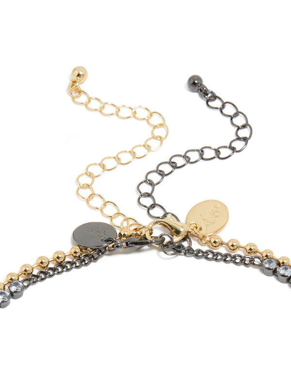 Detailed view of mixed metal plated cubic zirconia double layered tennis ball chain necklace and adjustable gold clasp detail view