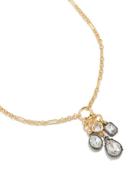 Showcasing a mixed metal plated diamante cluster drop necklace with cubic zirconia in gold statement style close up view - link has visual effect only